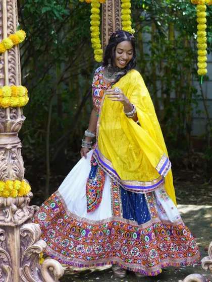 A twirling shot showing the beautiful ghagra choli and the complete festive look.