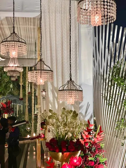 A close-up of our beautiful crystal chandeliers, which add a touch of glamour and sparkle to any event.