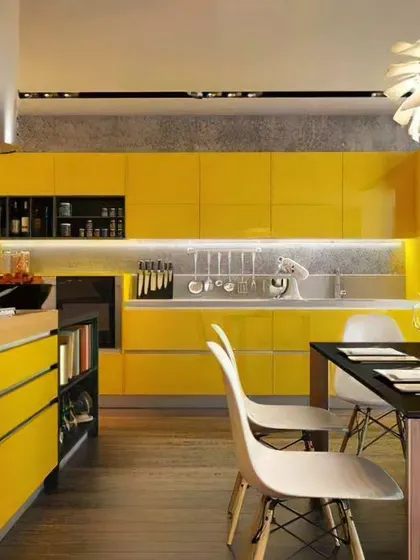 A stunning L-shaped kitchen in a brilliant high-gloss yellow. This design is perfect for those who want their kitchen to be a vibrant and energetic focal point of the home.