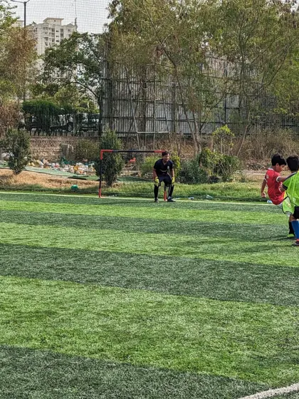 Our players swarm the opponent, working together to win back the ball in a friendly U10 game.