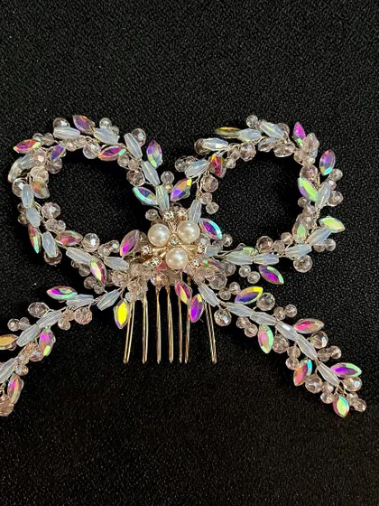 The craftsmanship on these crystal bows is exquisite. They are designed to be the centerpiece of your hairstyle.