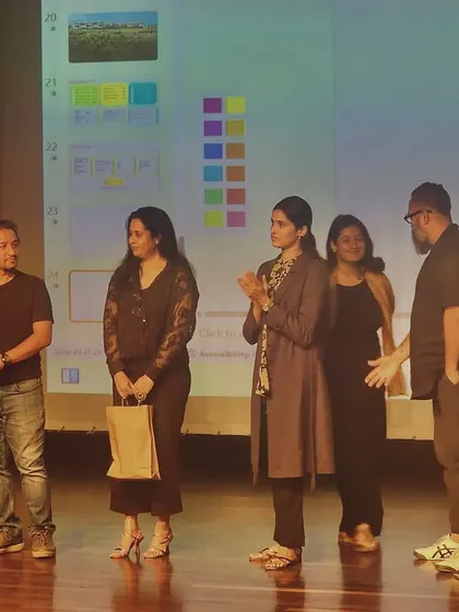 Our team on stage, being acknowledged for their work.