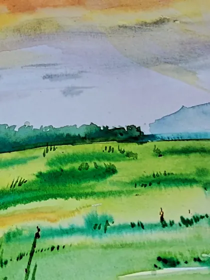 A serene landscape created with watercolors. In our classes, you can learn how to use this medium to capture the soft light and gentle colors of nature.