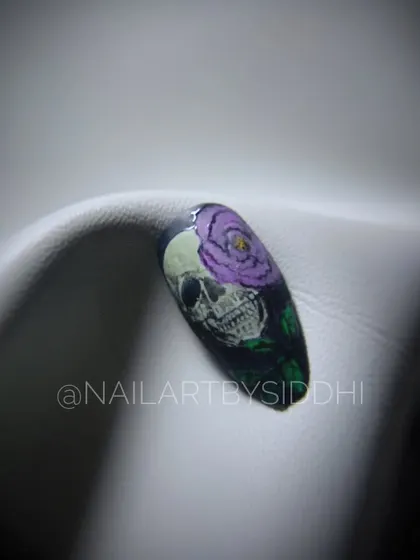 An edgy and artistic design featuring a detailed skull with a purple rose. This shows my versatility in handling different themes, from pretty to gothic.