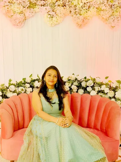 A quiet moment before hosting the engagement ceremony for Naini and Sagar. The beautiful floral backdrop was part of the theme we curated to create a romantic and elegant ambiance for this Sindhi and Gujarati celebration.
