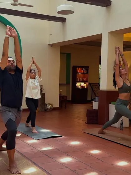 Holding a warrior pose during the class. The energy in this room was fantastic.