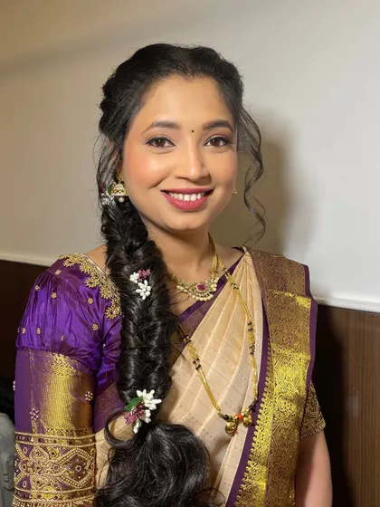 A happy smile from my client from the UK. It's always an honor to get clients ready who travel from so far.