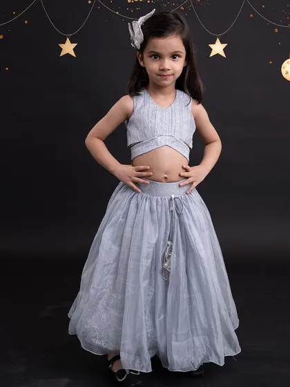 A simple and elegant grey crop top and skirt set, perfect for a minimalist festive look.