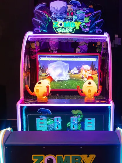 Get ready for Zomby Wars! This two-player arcade game is a huge hit with kids who love a fun challenge.