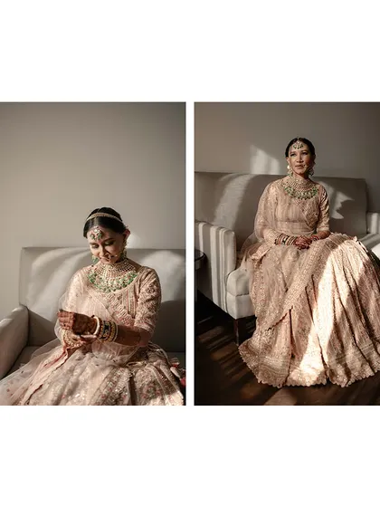 The bride, seated and bathed in streams of sunlight, creating a serene and artistic portrait.