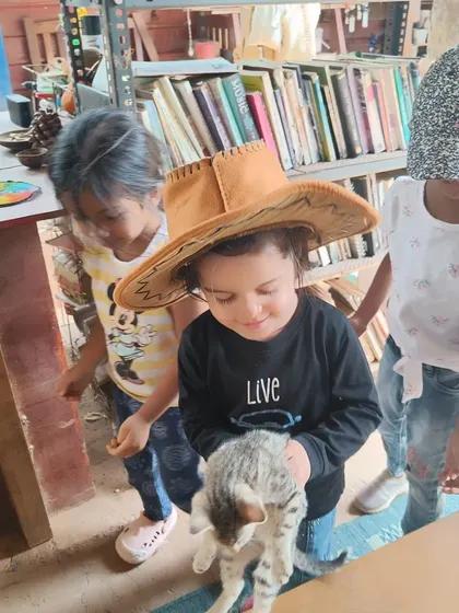 Interacting with animals teaches gentleness and empathy. Here, children get to meet and cuddle kittens during our visit to Hamsah Organic farm, a heartwarming experience for everyone.
