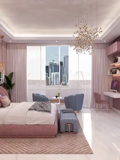 A 3D view of a luxurious and contemporary daughter’s bedroom with a soft pink palette, rose gold accents, and a dramatic floral chandelier. A cozy hangout nook completes the space.