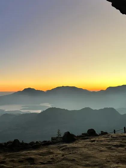 Another stunning sunrise view from a cave at Ratangad fort. These natural shelters provide a perfect frame for the morning sky.