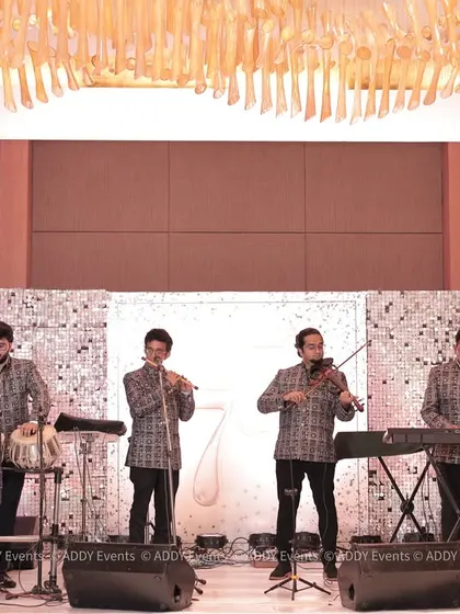 A soulful instrumental band sets a tone of pure elegance for a milestone 75th-anniversary celebration. We source and manage a diverse range of musical talent, from classical ensembles to contemporary bands, to create the perfect ambiance for any sophisticated gathering.