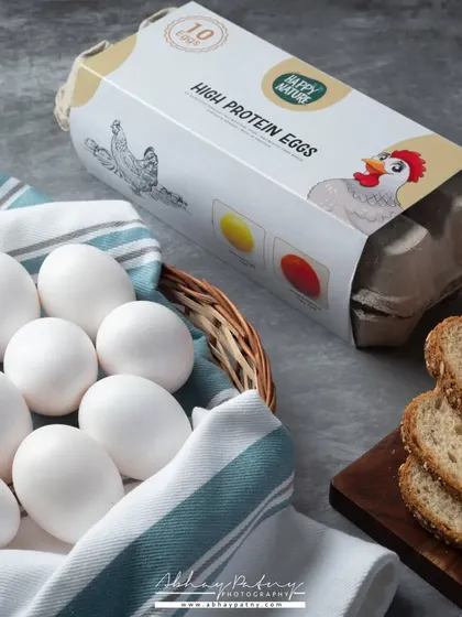 A clean, straightforward shot of high-protein eggs. The styling is minimal to convey a message of health, simplicity, and quality.