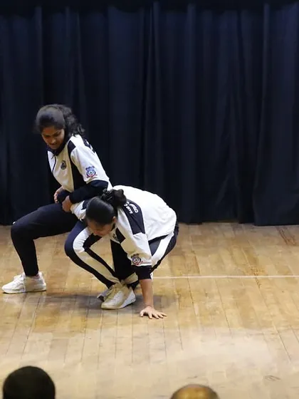 Two participants from our women's police training program demonstrate a defensive maneuver. This showcases the application of skills learned in our course, translating training into confident action.