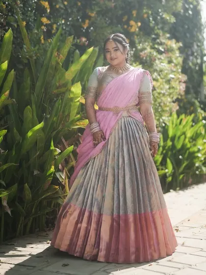 A full-length view of the pink and grey langa voni, a modern and elegant color combination.