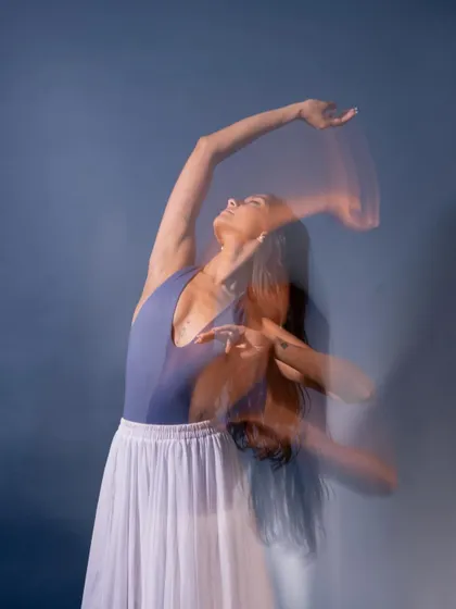 Another long-exposure shot from the 'swan song' series, showing the path of movement over time.