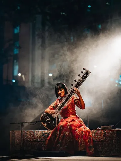Anoushka Shankar, captured in a moment of quiet intensity during her 'Chapters' tour. This image showcases our versatility, moving from high-energy rock to producing intimate, atmospheric concerts for world-renowned classical and fusion artists.