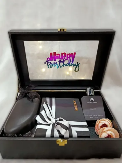 Another look at the Suede Box Hamper, loaded with gifts and lit up for that extra wow factor. It's fully customizable for any occasion.