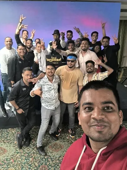 A group photo with the energetic marketing team from Fossil. It's always great to connect with the crowd after a successful event.