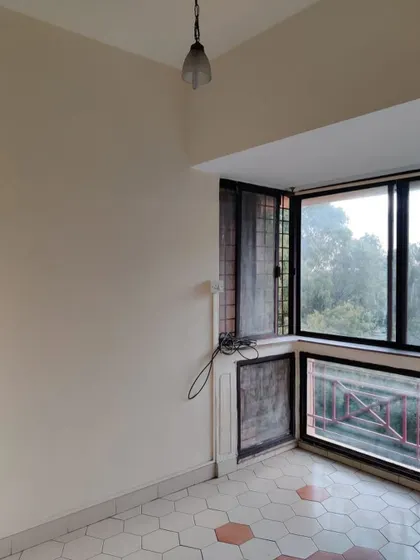 Another 'before' shot of the balcony, showing the awkward connection to the adjacent room that we later closed off to create a more defined and functional space.