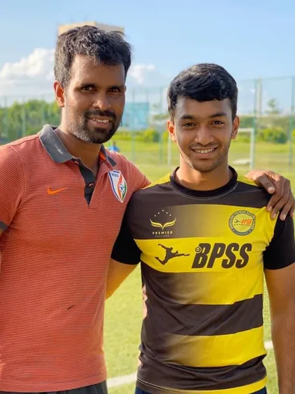 Posing with Akash after his re-signing. I am proud to continue supporting his journey in the A Division.
