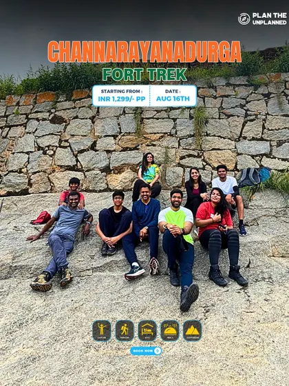 Friends relaxing on the ancient stones of Channarayanadurga Fort. It's a place where you can literally touch history.