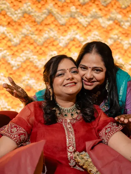 A heartwarming moment between the bride and her mother, their joy beautifully captured.