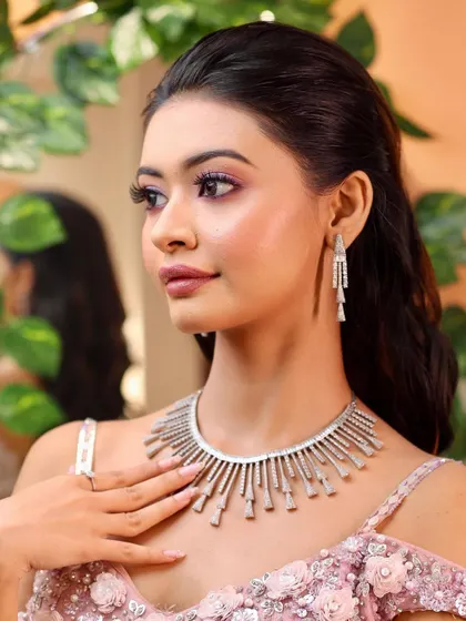 A real-life Barbie look. Your portfolio will feature these glamorous, dreamy looks with soft pinks and shimmering diamonds.