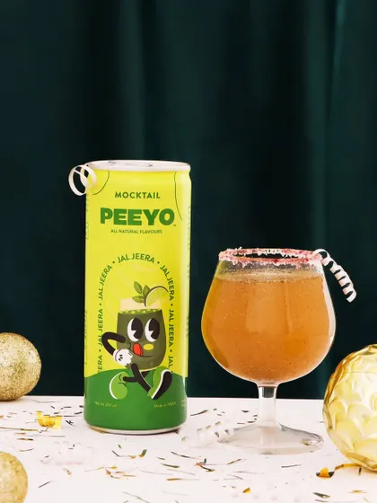 Here, I've shown the mocktail mixer in use, served in a glass with a sugared rim. This helps customers visualize the end product and entices them with a ready to drink party beverage.