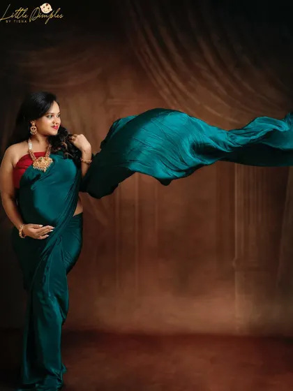 The wind-swept saree effect is one of my favorite techniques for adding drama and elegance to a maternity portrait. She styled her bump with so much grace.