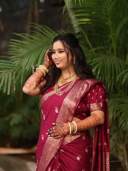 A candid and joyful shot. The bride's makeup is designed to be long-lasting, so she can laugh and celebrate without any worries.