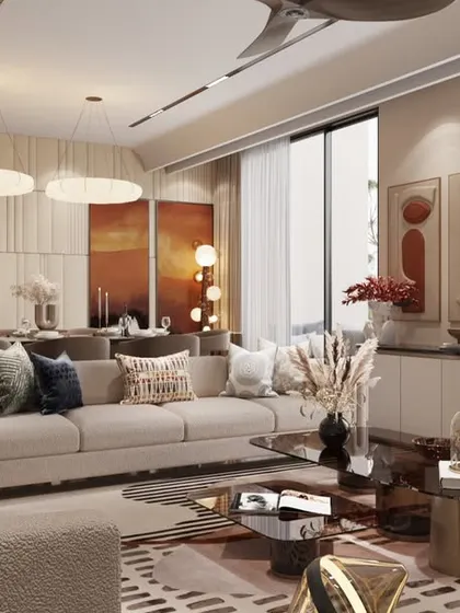 A 3D render of an open-plan living and dining area, showcasing our vision for a space where modern elegance meets soulful comfort. The design uses a palette of soft neutrals and earthy tones, elevated by sculptural lighting and textural fabrics.