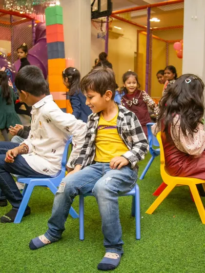 The moment the music stops in musical chairs. Everyone scrambles to find a seat in this exciting and competitive game.