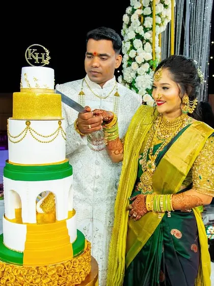Another angle of the couple cutting their royal engagement cake, a memory they will cherish forever.