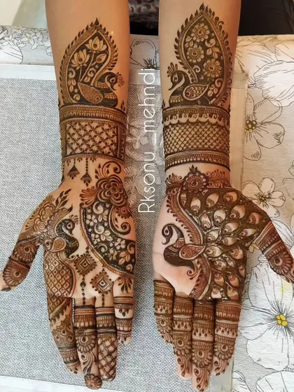 This gallery showcases a variety of my traditional designs. You'll find classic elements like peacocks, elephants, lotuses, and intricate jaali (net) patterns, all expertly crafted to create timeless beauty.