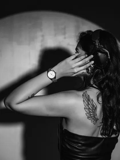 A black and white shot from my collaboration with Armani Exchange. This photo, showing my wing tattoo, was part of the campaign for their latest watch collection.