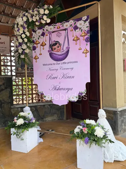 A personalized welcome sign for a naming ceremony. The lavender color scheme and the "little princess" theme are carried through from the entrance to the main stage.
