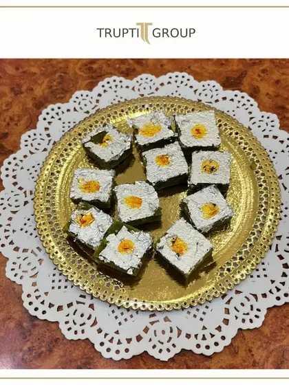 Life's too short to not have a ladoo-filled plot twist. A plate of our exquisite Anjeer Paan, covered in silver vark.