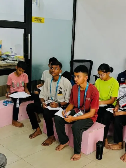 Mindset training is just as important as physical training. Here, our head coach leads a classroom session for young cadet athletes, teaching them the mental skills needed to become a champion.