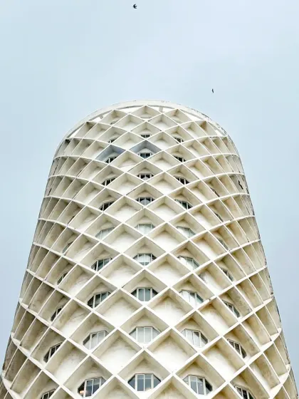 The iconic cylindrical structure of the Nehru Centre in Worli, Mumbai, designed in 1985. Its unique diagrid facade makes it a landmark of institutional design, shaping public experience and cultural memory in the city.