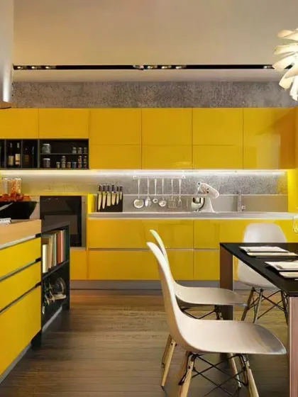 A duplicate of image 143, this kitchen makes a bold statement with vibrant, glossy yellow cabinets and an integrated dining area.