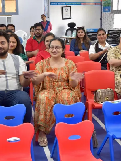 A moment of interactive fun during the parent orientation. We believe that parents are our partners in education, and these sessions are a great way to build a strong community.