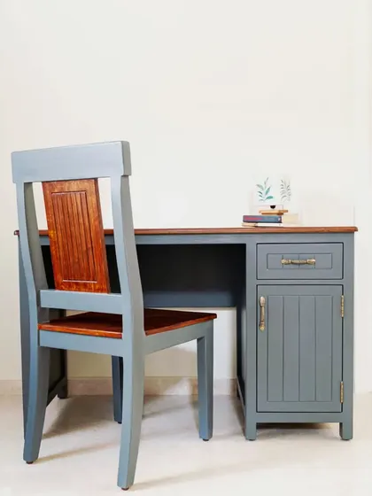 A work/study desk and chair set with a two-tone finish. The grey painted frame contrasts beautifully with the natural wood top and seat, creating a modern yet warm look.