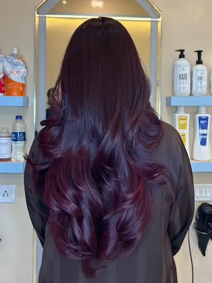 A Violet Flame hair makeover. This unique, multidimensional violet hue is eye-catching and full of character.