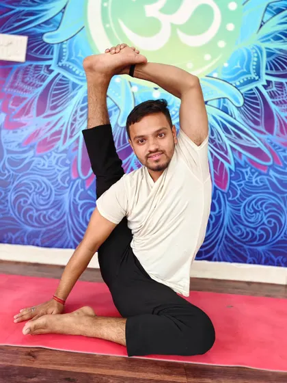 A standing pose that showcases incredible hamstring flexibility and balance.