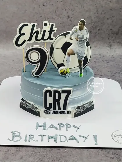 A cake for a Cristiano Ronaldo fan. This CR7-themed cake features the football star, a soccer ball, and his iconic number for a 9th birthday.