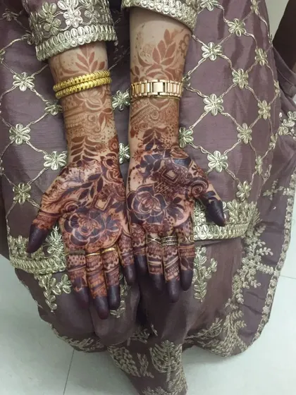 A rich, dark stain perfect for Eid or any celebration. The deep color on the palms and fingertips is a hallmark of my work.