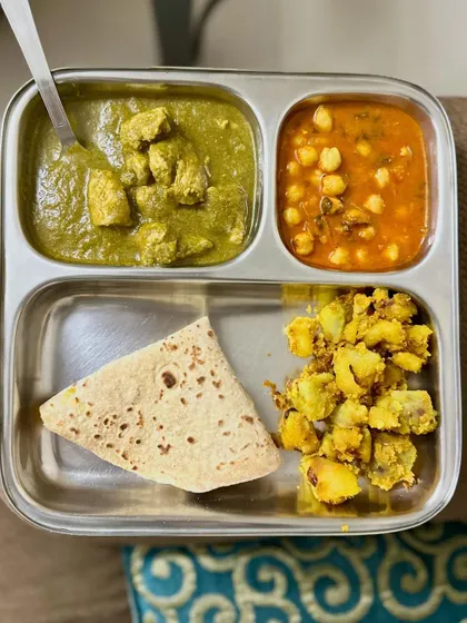 Another look at the delicious double-protein meal of chapati, chicken palak, chana masala, and sautéed potato.